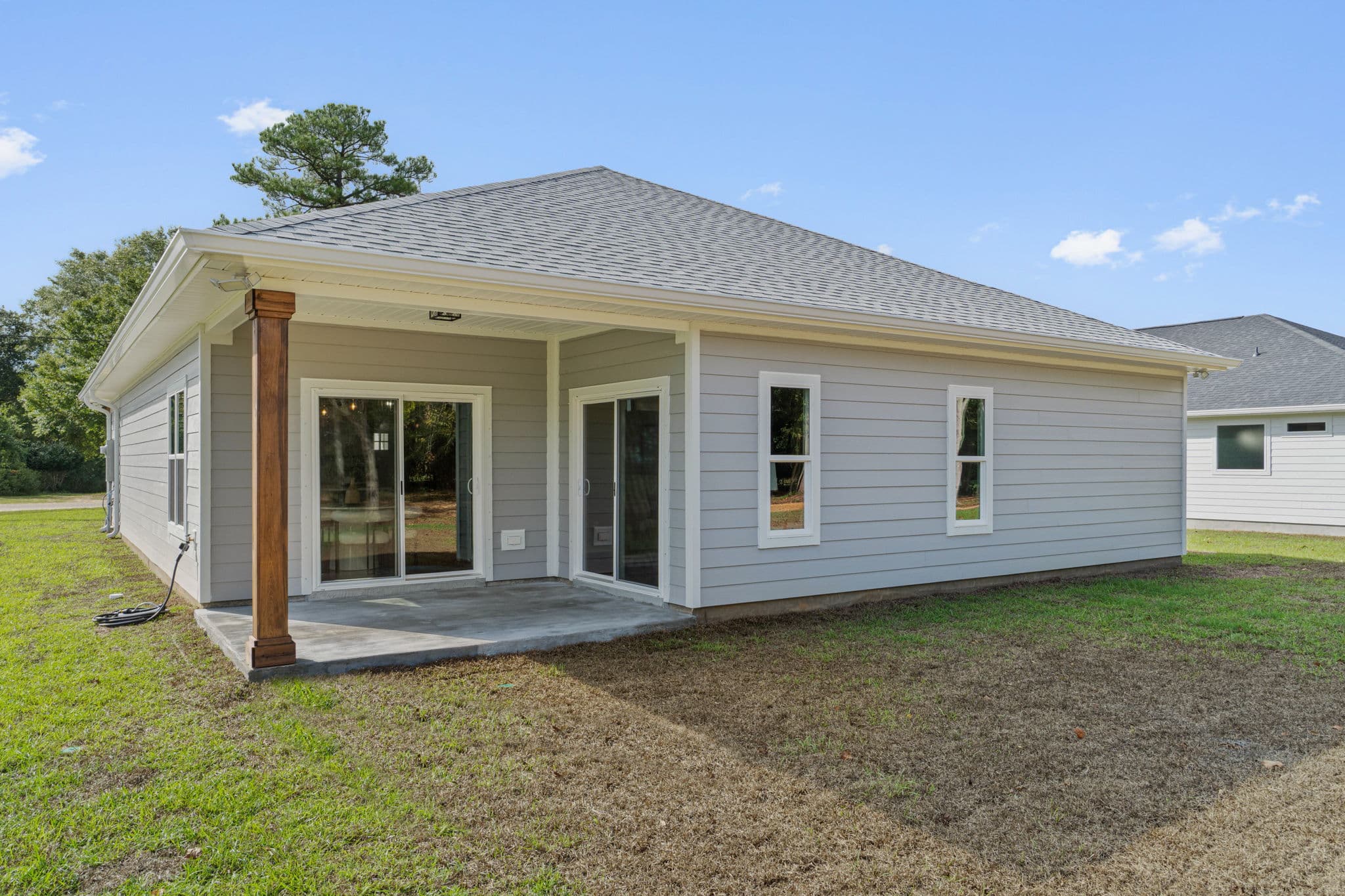 Finished home exterior with a new roof